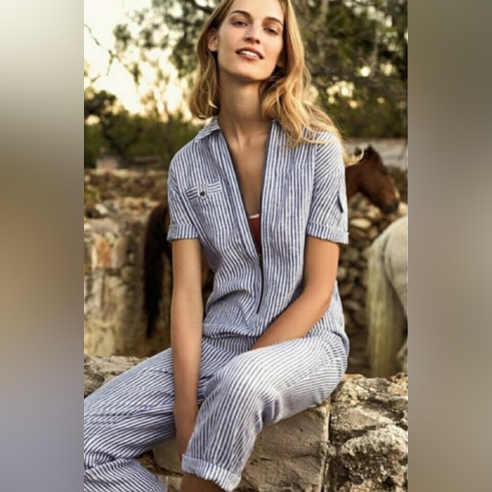 Anthro jumpsuit by Cartonnier. Blue & white stripe zip up. Size women’s small